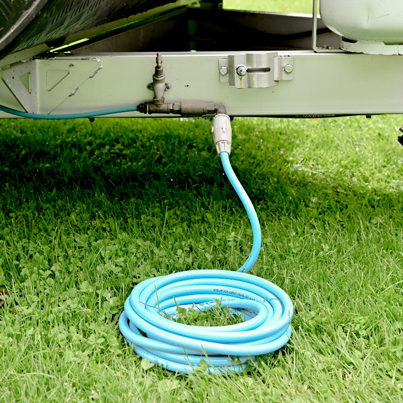 Hoselink Drinking Water Hose connected to a caravan water inlet