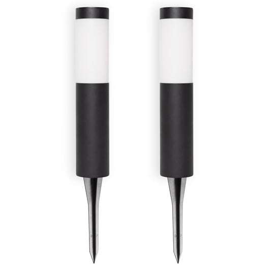 Two black solar ground lights on a white background