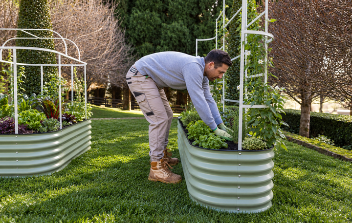 Man filling garden bed