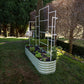 9 in 1 trellis attached to 9 in 1 garden bed on grass. hose reel in the back ground.