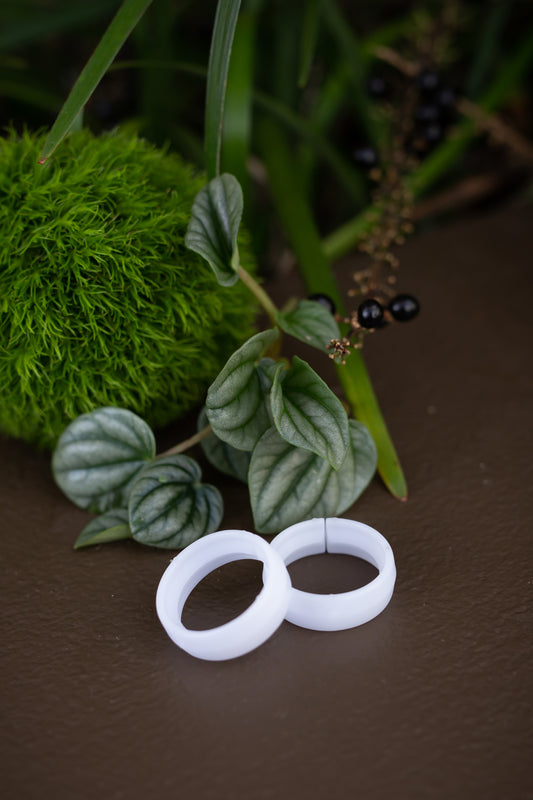 white split rings amongst some greenery