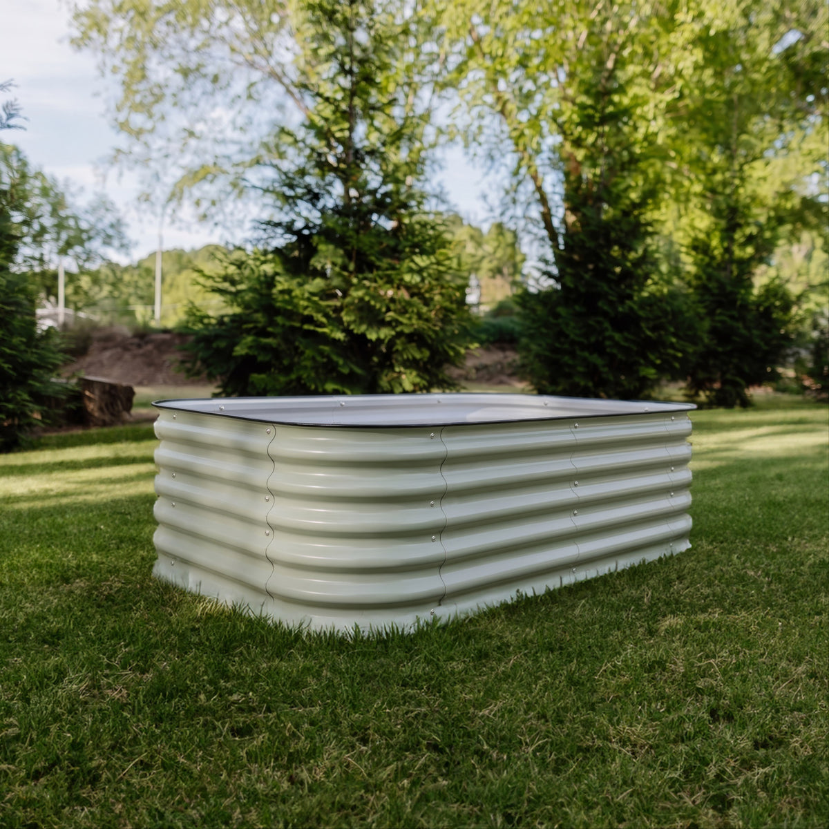 6 in 1 Garden Bed sitting on the grass, not filled with soil yet.