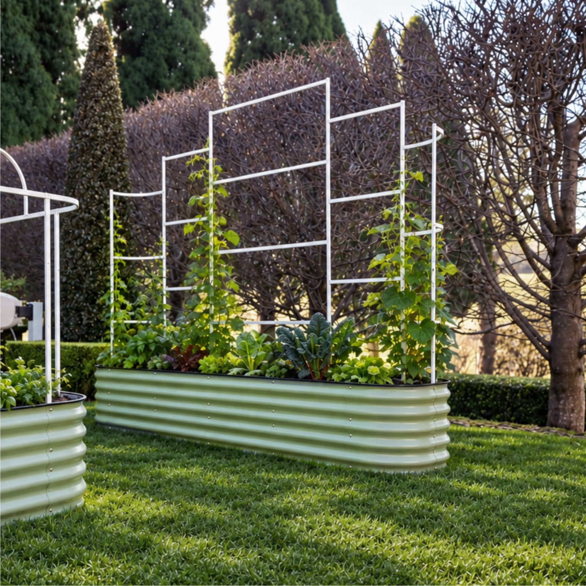 9 in 1 metal wall trellis attached to 9 in 1 Garden Bed on grass in front of trees