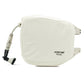 Beige evolve hose reel cover fitted on reel on white background