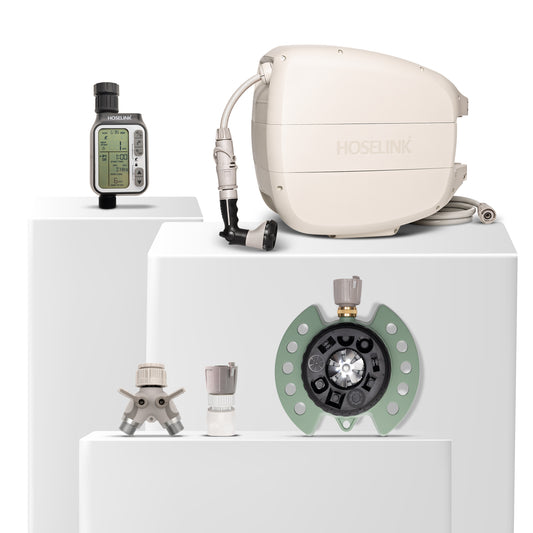 Beige evolve hose reel, grren 9-pattern spirnkler, automatic tap timer, 2-way tap aapter and click-on adapter set bundle on a white background