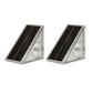 Two solar step lights on a white background