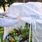 Greenhouse E cover being opened from the side