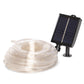 White background with coil of rope solar light and panel
