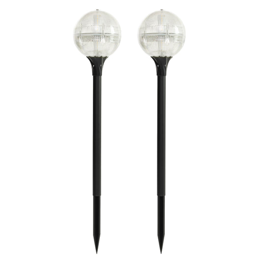 Two solar garden globe lights on a white background