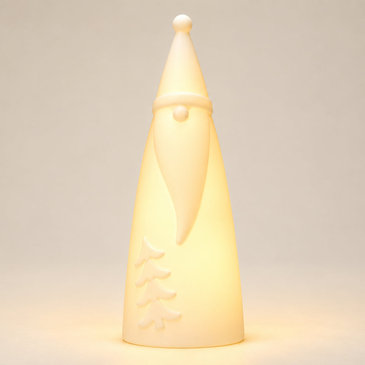 Tall Solar Santa light on a white background, illuminated warm white in colour.