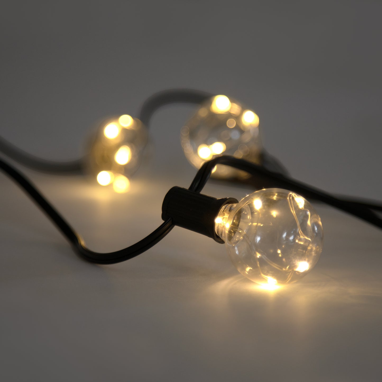 Solar party Garland globe on white table