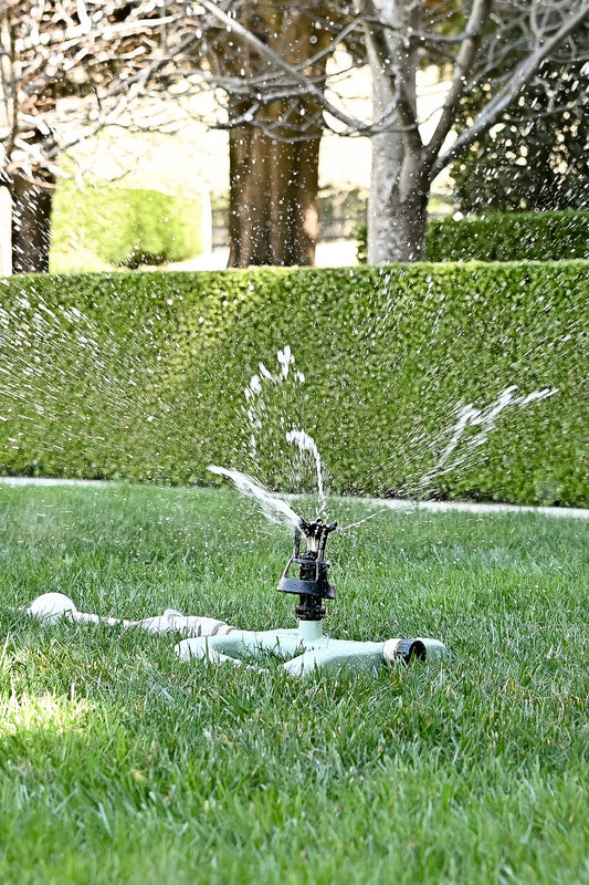 Wobble Sprinkler turned on watering large lawn