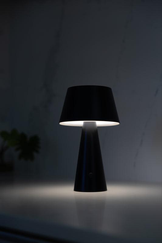 Indoor Outdoor Solar Table Lamp sitting on marble bench