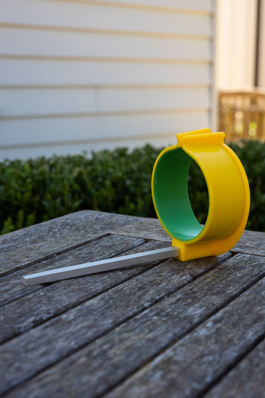 PETA Easi-Grip Arm Support Cuff, seated on a deck by itself